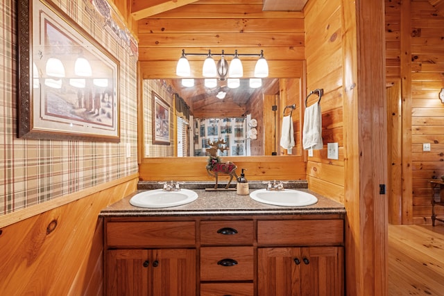 1564 High Ridge Rd, Middleburg, KY 42541 - bathroom with wooden walls, double vanity, and wallpapered walls