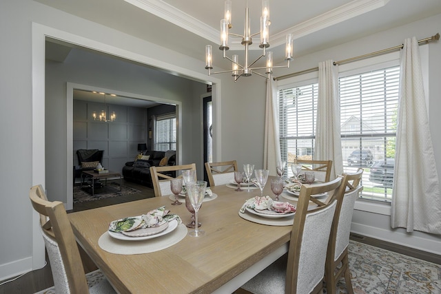 3536 Night Heron Way, Lexington, KY 40515 - dining room with crown molding, a chandelier, healthy amount of natural light, and wood finished floors