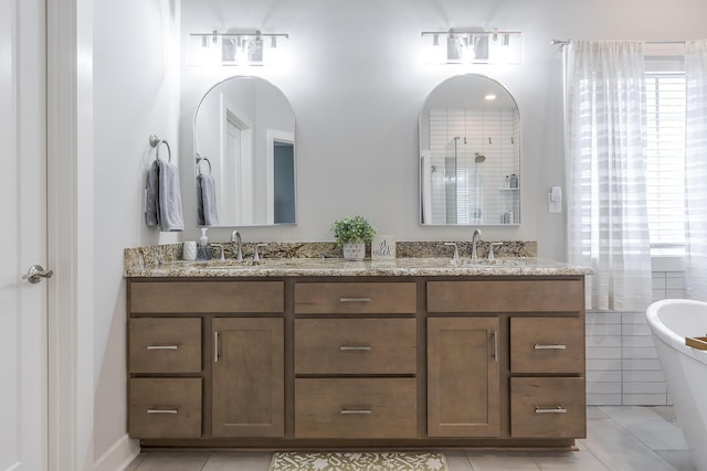 3536 Night Heron Way, Lexington, KY 40515 - full bathroom with double vanity, a soaking tub, and tile patterned floors