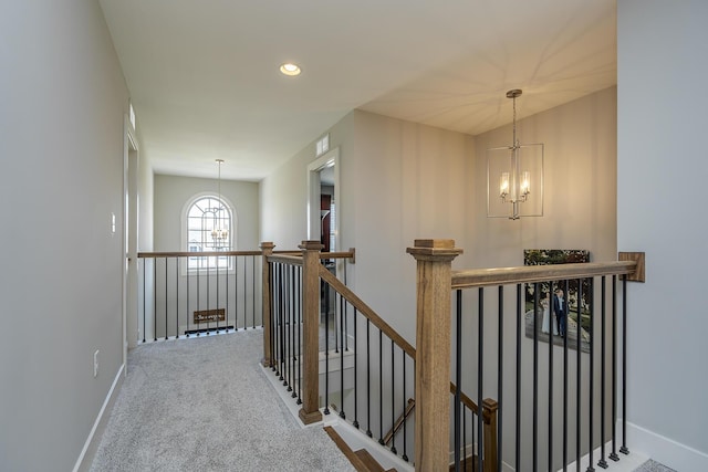 3536 Night Heron Way, Lexington, KY 40515 - hall with an upstairs landing, a chandelier, carpet, and recessed lighting