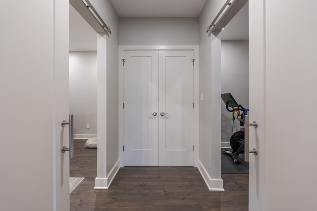3536 Night Heron Way, Lexington, KY 40515 - foyer featuring a barn door and dark wood-style flooring