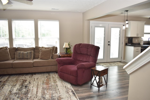 2340 Mulundy Way, Lexington, KY 40511 - living area with wood finished floors, plenty of natural light, ceiling fan, and french doors
