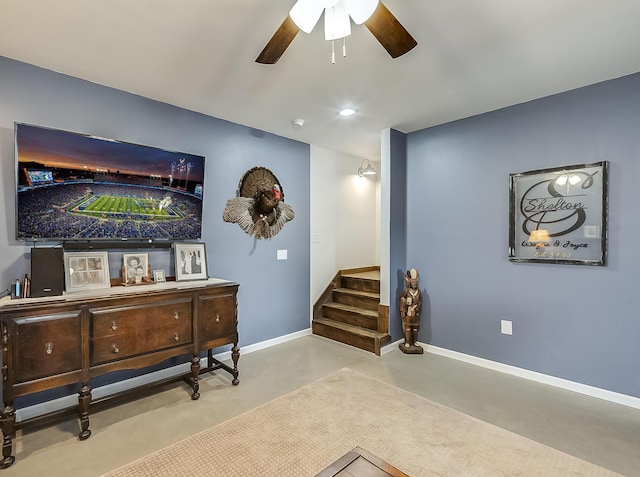 1011 Brown Store Rd, Lawrenceburg, KY 40342 - sitting room featuring finished concrete floors, a ceiling fan, stairs, and recessed lighting