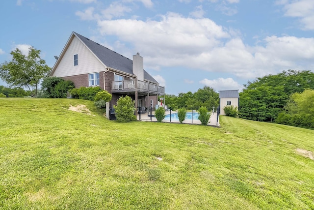 1011 Brown Store Rd, Lawrenceburg, KY 40342 - view of grassy yard featuring an outdoor pool, a patio, and a deck