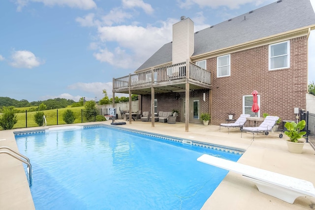 1011 Brown Store Rd, Lawrenceburg, KY 40342 - view of swimming pool featuring an outdoor living space, a fenced backyard, a patio area, and a diving board