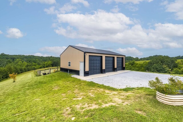 1011 Brown Store Rd, Lawrenceburg, KY 40342 - detached garage with a wooded view