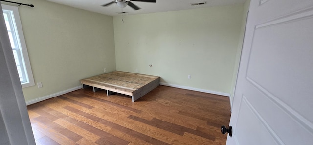 4020 Greentree Rd, Versailles, KY 40383 - unfurnished bedroom with wood finished floors and a ceiling fan