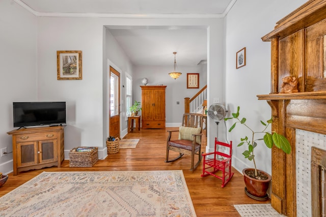 334 Oldham Ave, Lexington, KY 40502 - entryway featuring wood finished floors, ornamental molding, and stairway