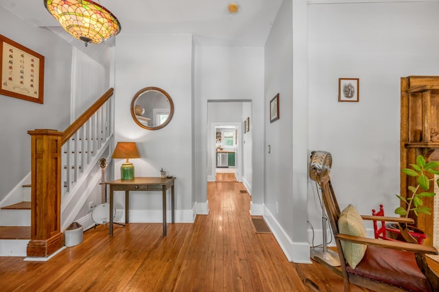 334 Oldham Ave, Lexington, KY 40502 - hallway featuring hardwood / wood-style floors and stairs