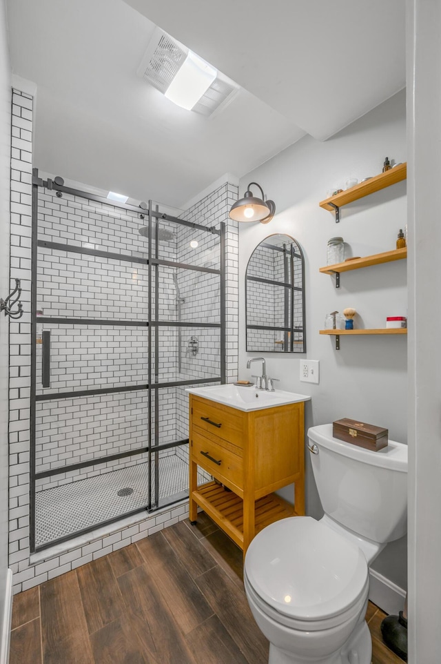 334 Oldham Ave, Lexington, KY 40502 - bathroom with vanity, a stall shower, and wood finished floors