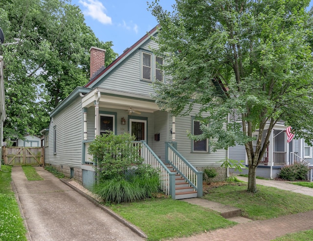 334 Oldham Ave, Lexington, KY 40502 - bungalow with a porch, a gate, a ceiling fan, and a chimney