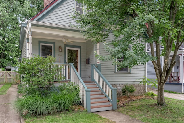 334 Oldham Ave, Lexington, KY 40502 - view of front of property featuring ceiling fan, a chimney, and covered porch