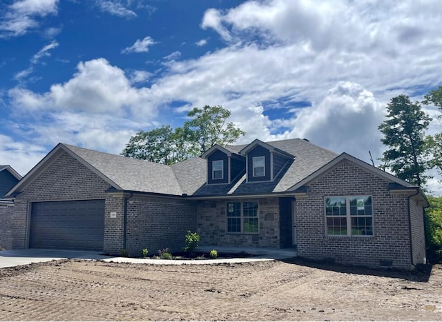 209 Patriot Trl, Berea, KY 40403 - view of front of home featuring a garage, brick siding, concrete driveway, and roof with shingles