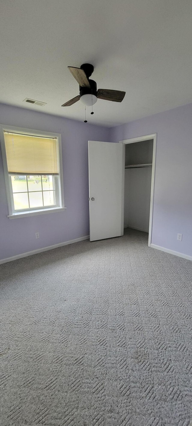 63 Mayme Ln, Stanford, KY 40484 - unfurnished bedroom with carpet floors, a closet, and a ceiling fan