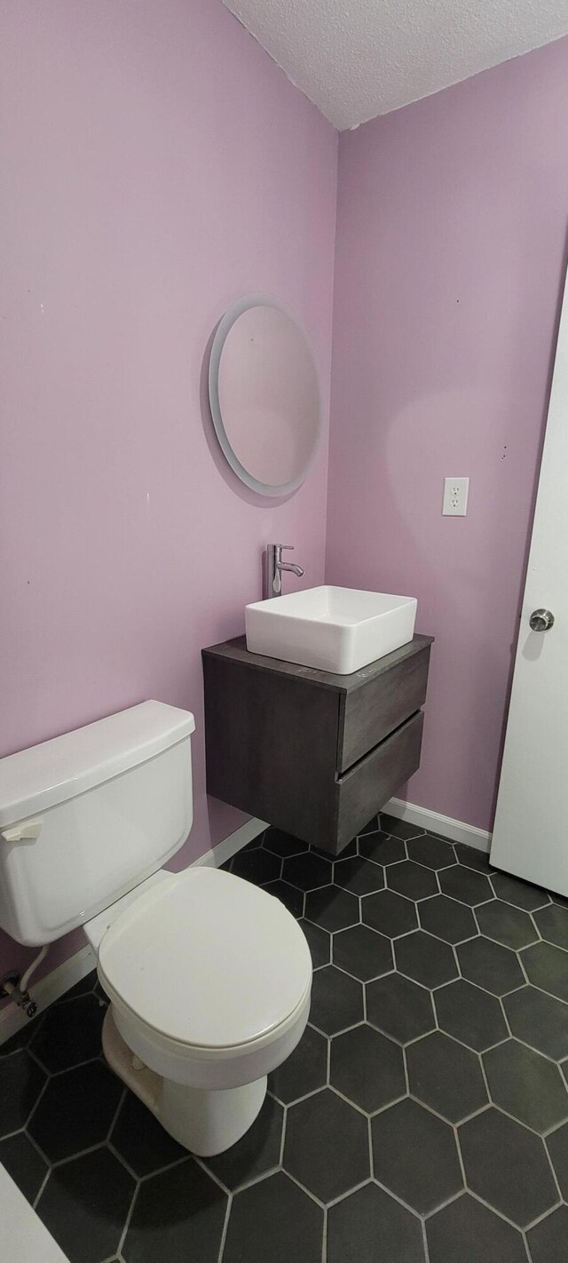 63 Mayme Ln, Stanford, KY 40484 - bathroom featuring vanity and a textured ceiling