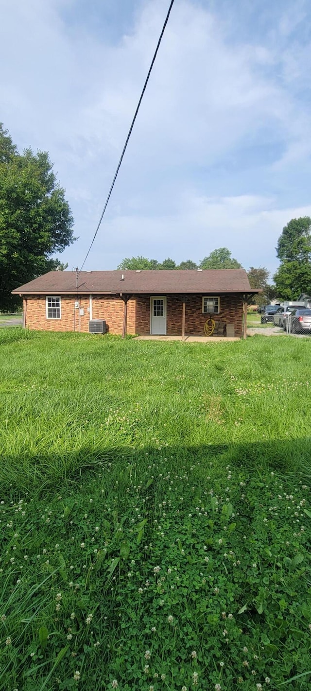 63 Mayme Ln, Stanford, KY 40484 - rear view of house featuring brick siding