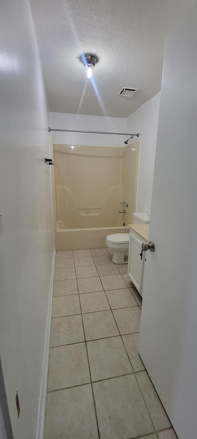 63 Mayme Ln, Stanford, KY 40484 - bathroom featuring tile patterned flooring, a textured ceiling, vanity, and tub / shower combination