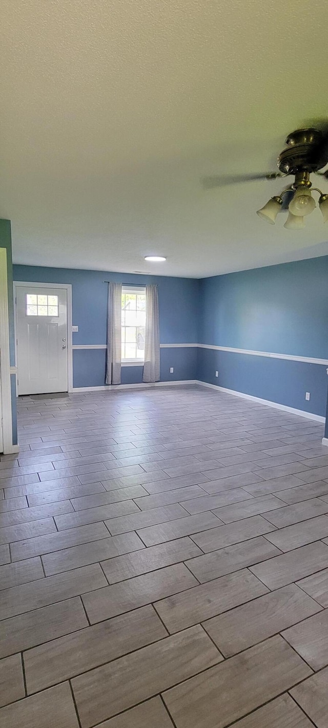 63 Mayme Ln, Stanford, KY 40484 - unfurnished room with wood tiled floors and a ceiling fan