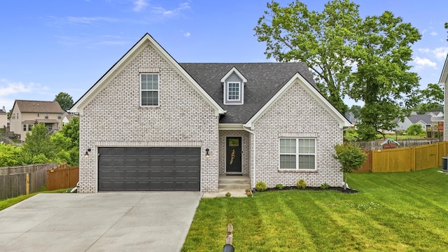 111 Kara Bryn Cv, Georgetown, KY 40324 - traditional-style home with driveway, brick siding, roof with shingles, and an attached garage