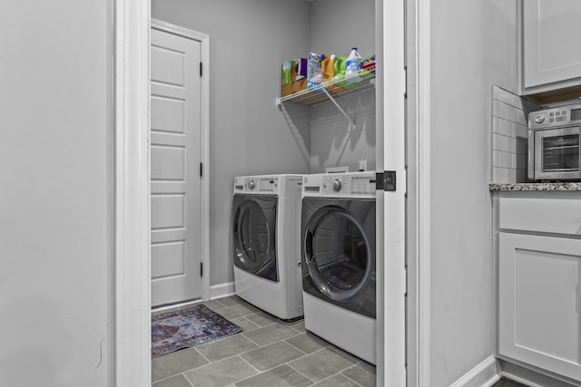 111 Kara Bryn Cv, Georgetown, KY 40324 - washroom with separate washer and dryer and light tile patterned floors