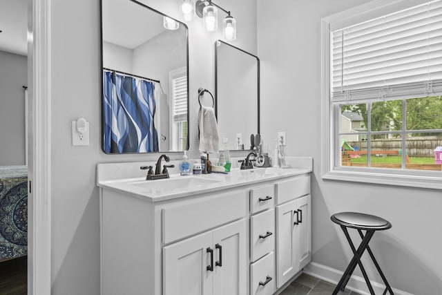 111 Kara Bryn Cv, Georgetown, KY 40324 - full bathroom featuring double vanity and baseboards
