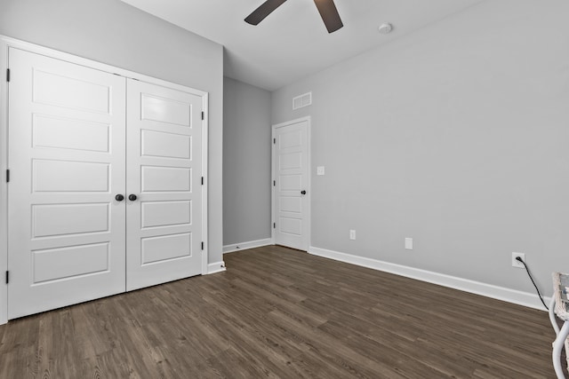 111 Kara Bryn Cv, Georgetown, KY 40324 - unfurnished bedroom with dark wood-type flooring, a closet, and ceiling fan
