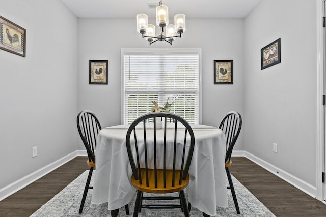 111 Kara Bryn Cv, Georgetown, KY 40324 - dining space with a chandelier and dark wood-style floors
