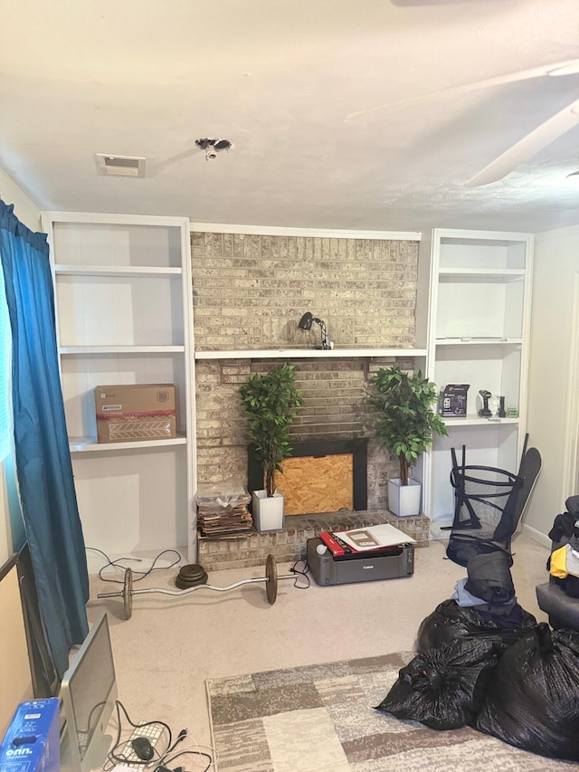 2829 Easthills Dr, Lexington, KY 40517 - living area featuring a fireplace, carpet, and built in shelves
