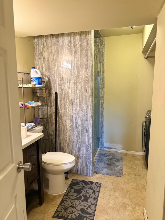 2829 Easthills Dr, Lexington, KY 40517 - bathroom featuring washer / dryer, a stall shower, tile patterned floors, and vanity