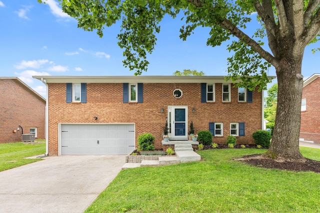 441 Cromwell Way, Lexington, KY 40503 - raised ranch featuring an attached garage, concrete driveway, a front lawn, and brick siding