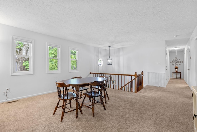 441 Cromwell Way, Lexington, KY 40503 - carpeted dining room featuring a textured ceiling and attic access