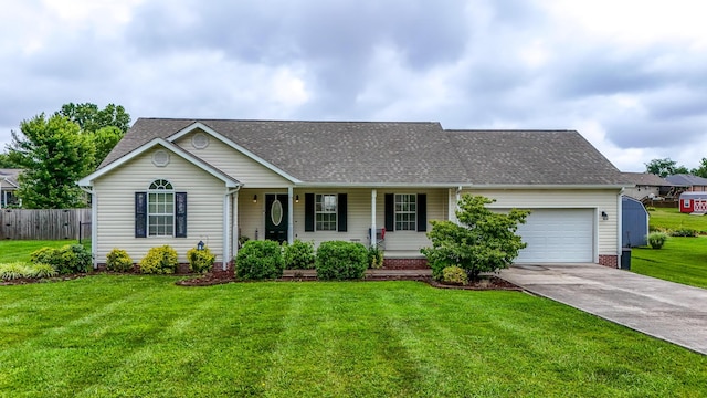 51 Stony Brook Dr, Corbin, KY 40701 - view of front of house with a porch, an attached garage, driveway, and a shingled roof