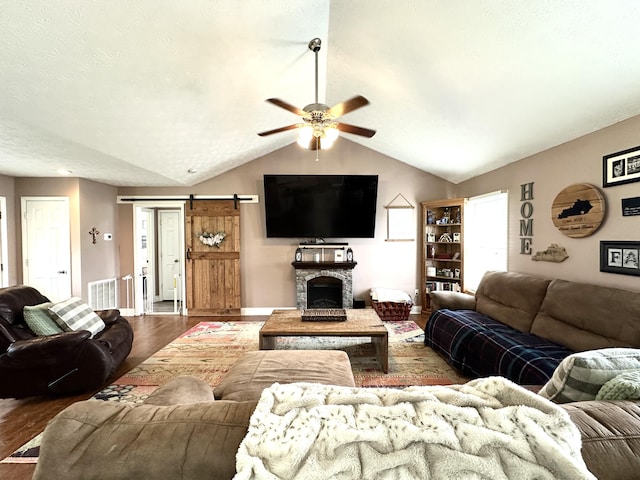 51 Stony Brook Dr, Corbin, KY 40701 - living room with ceiling fan, wood finished floors, lofted ceiling, and a barn door