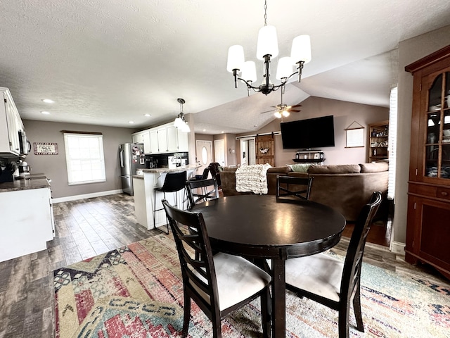 51 Stony Brook Dr, Corbin, KY 40701 - dining room with a ceiling fan, a chandelier, wood finished floors, recessed lighting, and lofted ceiling