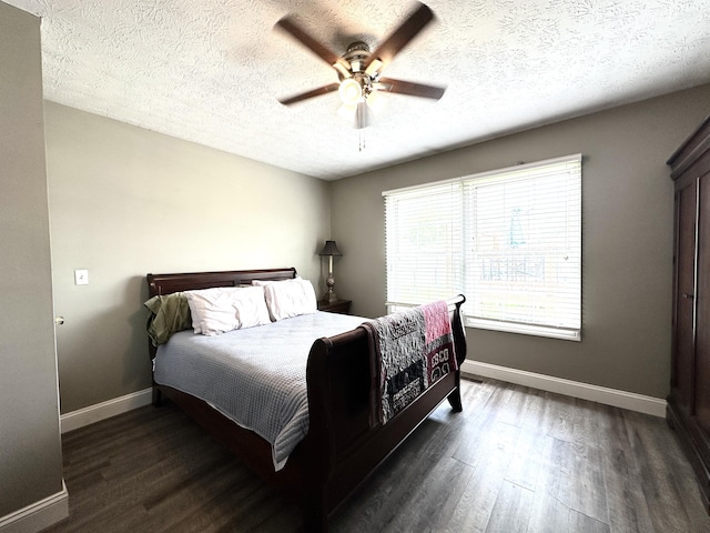 51 Stony Brook Dr, Corbin, KY 40701 - bedroom with dark wood-style flooring, a textured ceiling, and ceiling fan
