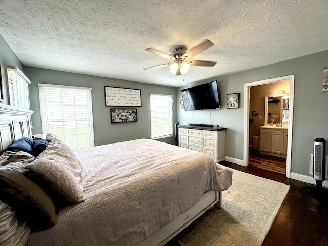 51 Stony Brook Dr, Corbin, KY 40701 - bedroom with dark wood-type flooring, a ceiling fan, ensuite bathroom, and a textured ceiling