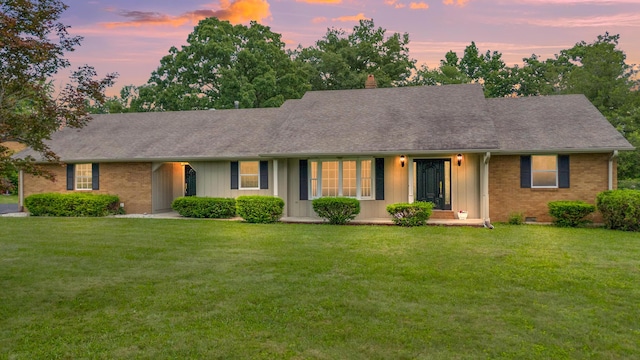 117 S Cumberland St, Berea, KY 40403 - ranch-style home featuring brick siding, a lawn, and roof with shingles