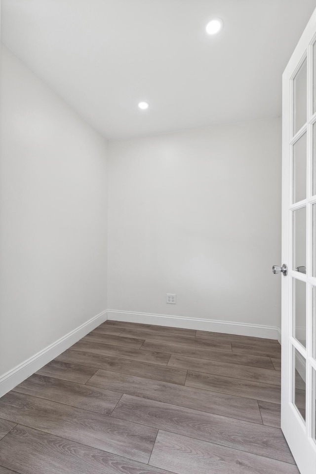 117 S Cumberland St, Berea, KY 40403 - spare room featuring recessed lighting, wood finished floors, and french doors