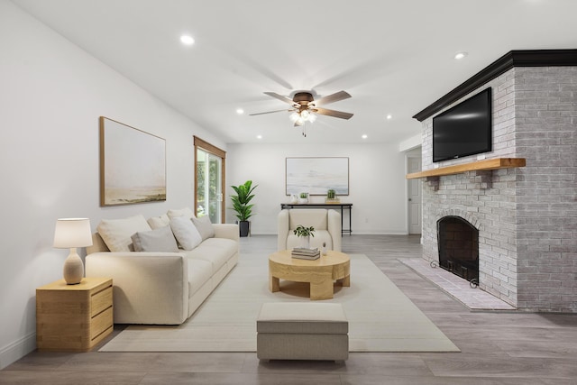 117 S Cumberland St, Berea, KY 40403 - living room featuring a ceiling fan, a fireplace, recessed lighting, and wood finished floors