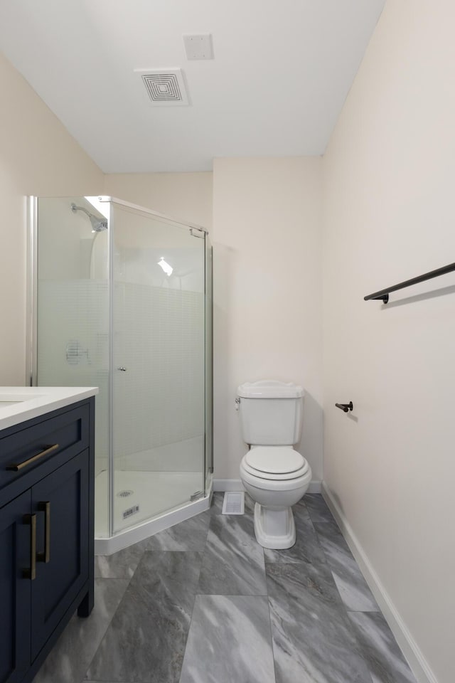 117 S Cumberland St, Berea, KY 40403 - bathroom with a shower stall, vanity, and marble finish floors