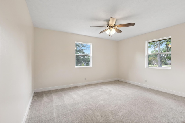 117 S Cumberland St, Berea, KY 40403 - carpeted spare room featuring healthy amount of natural light and a ceiling fan