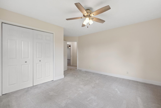 117 S Cumberland St, Berea, KY 40403 - unfurnished bedroom with light colored carpet, a closet, and a ceiling fan
