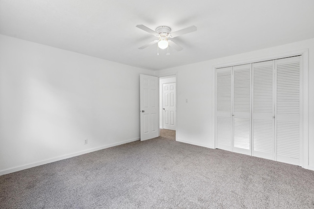 117 S Cumberland St, Berea, KY 40403 - unfurnished bedroom with carpet floors, a closet, and a ceiling fan