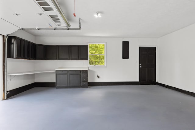 117 S Cumberland St, Berea, KY 40403 - garage featuring electric panel and baseboards