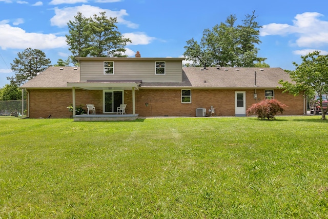 117 S Cumberland St, Berea, KY 40403 - back of house with brick siding, a chimney, a patio, and a shingled roof