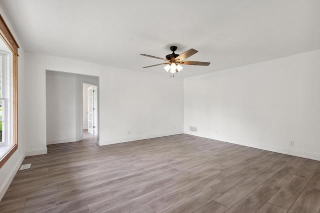 117 S Cumberland St, Berea, KY 40403 - unfurnished room with a ceiling fan and wood finished floors
