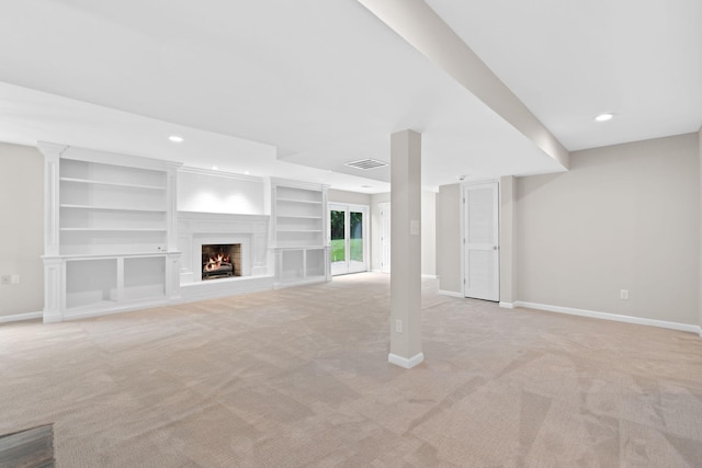 3605 Afton Pl, Lexington, KY 40515 - unfurnished living room with light colored carpet, a lit fireplace, recessed lighting, and built in features