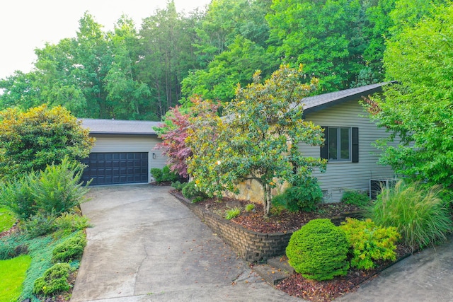 1211 Forest Circle Dr, Corbin, KY 40701 - view of property hidden behind natural elements featuring driveway and an attached garage