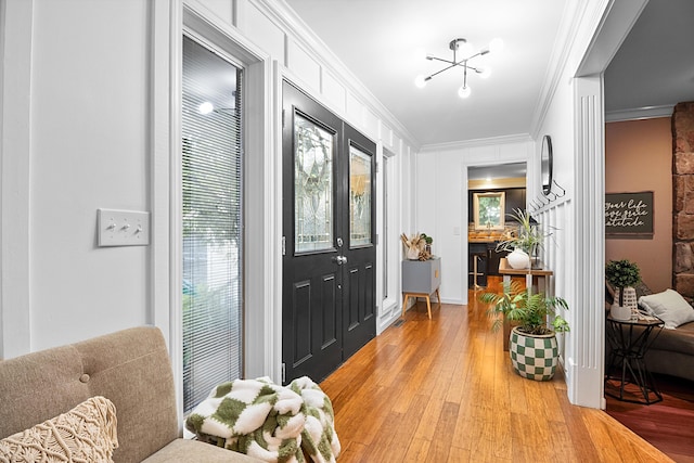 1211 Forest Circle Dr, Corbin, KY 40701 - foyer featuring crown molding and light wood-style flooring