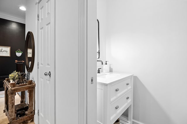 1211 Forest Circle Dr, Corbin, KY 40701 - bathroom featuring vanity, crown molding, and wood finished floors